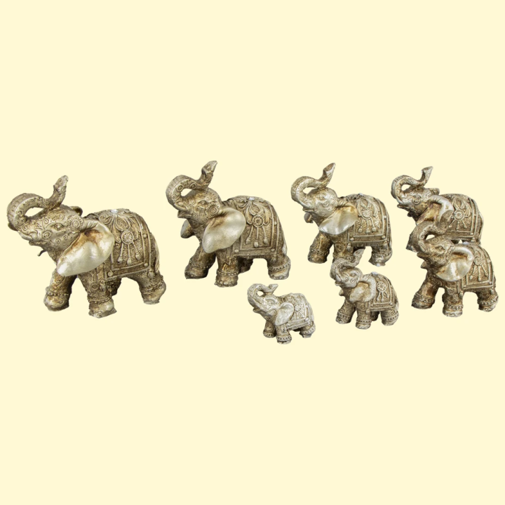 Set of Figures 7 Elephants light, polystone, 4 cm, 5,5 cm, 7,5 cm, 7,8 cm, 8,4 cm, 9,4 cm,10,3 cm