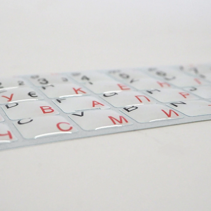 Sticker.Letters for keyboard German-Russian, black/red, white background, volumetric.
